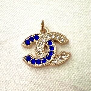 CHANEL Gold Blue Crystal pendant with Iconic CC Design, charm necklace jewelry